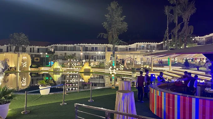 Hotel Rajhans, Surajkund — evening venue lit up at night